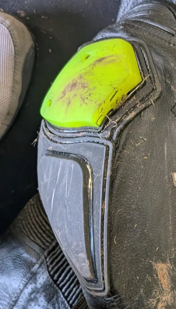 Leathers First race suit knee slider and knee panel after a crash